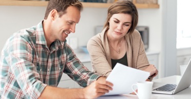 Couple reviewing resources together.